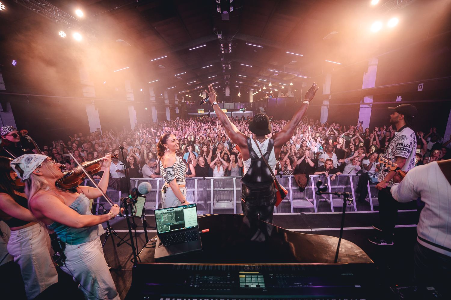 R&B Orchestra performing live to a packed arena